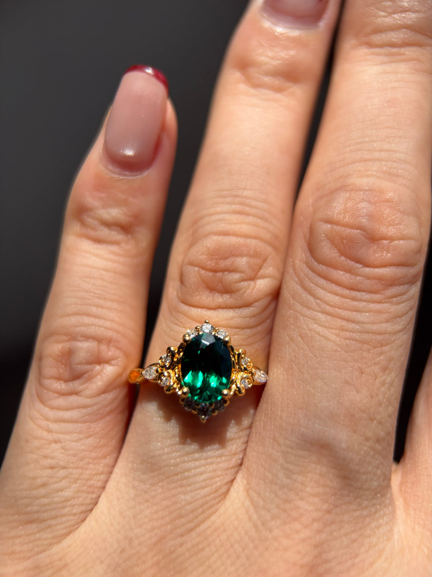 Forest Empress Non-traditional Engagement Ring with oval lab emerald 18k gold