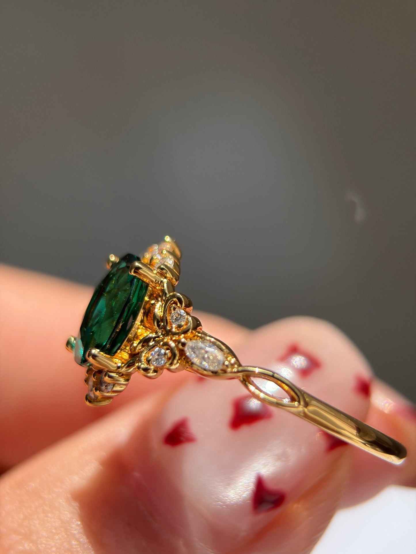 Forest Empress Non-traditional Engagement Ring with oval lab emerald 18k gold