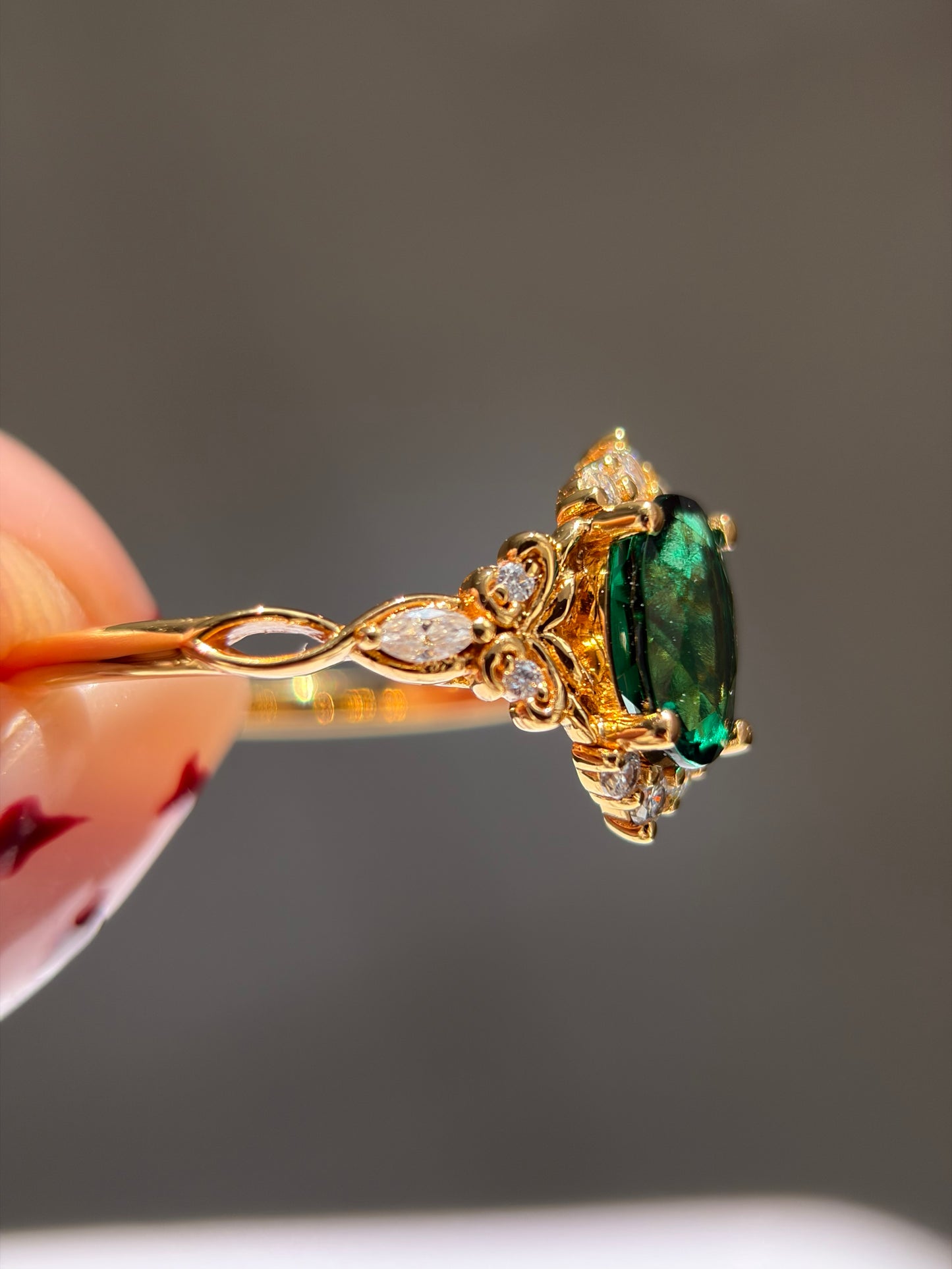 Forest Empress Non-traditional Engagement Ring with oval lab emerald 18k gold