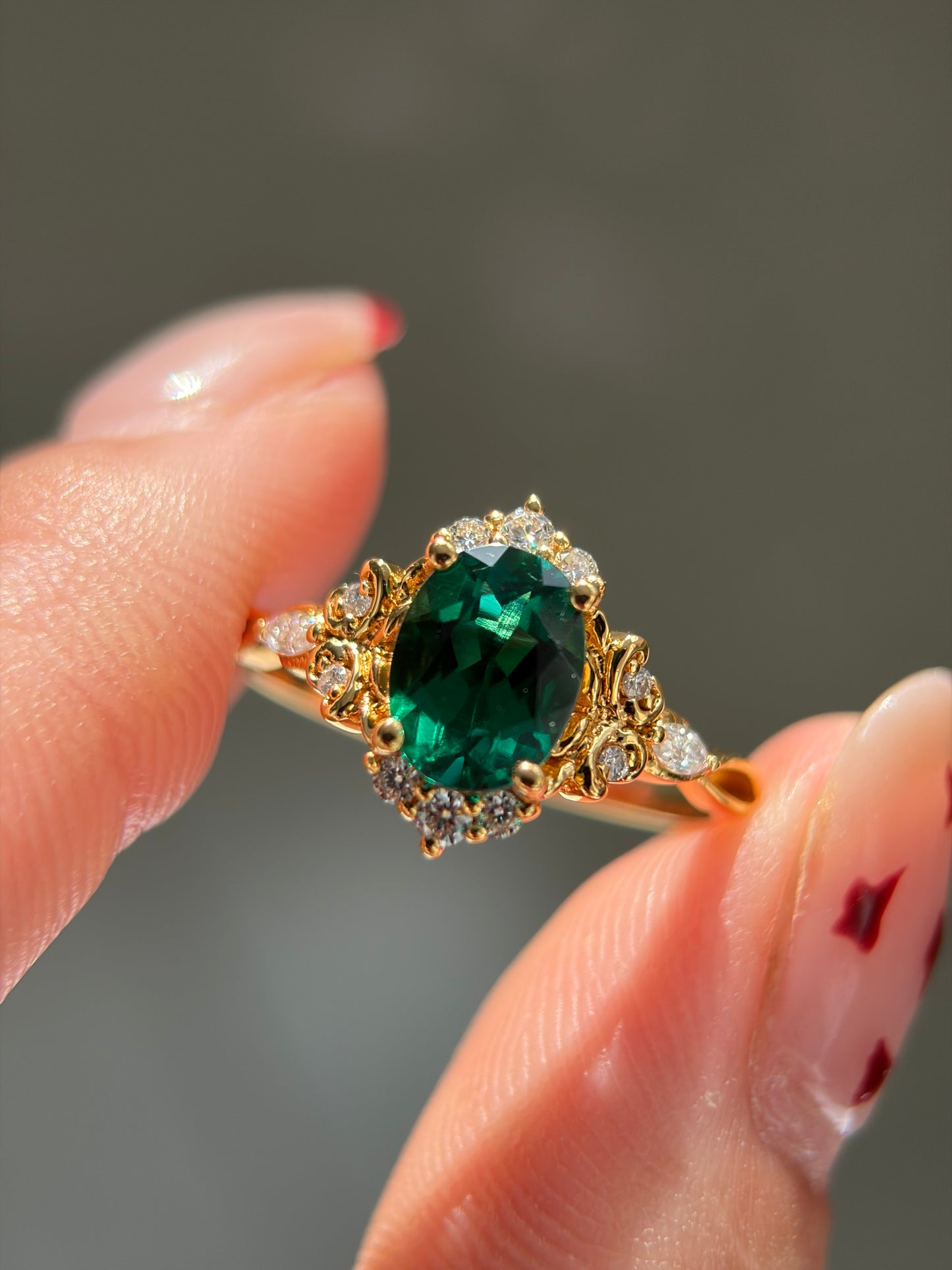 Forest Empress Non-traditional Engagement Ring with oval lab emerald 18k gold
