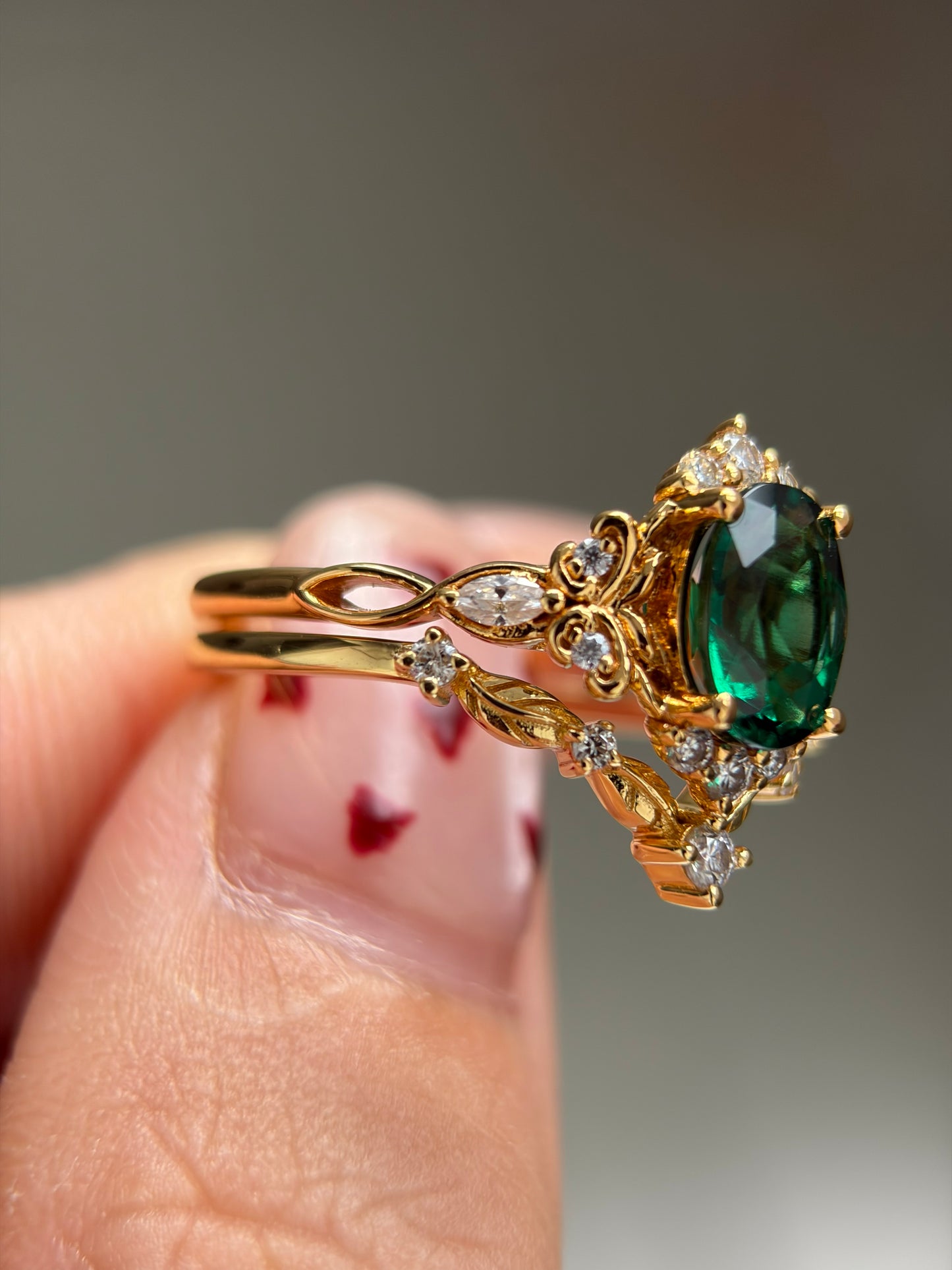 Forest Empress Non-traditional Engagement Ring with oval lab emerald 18k gold