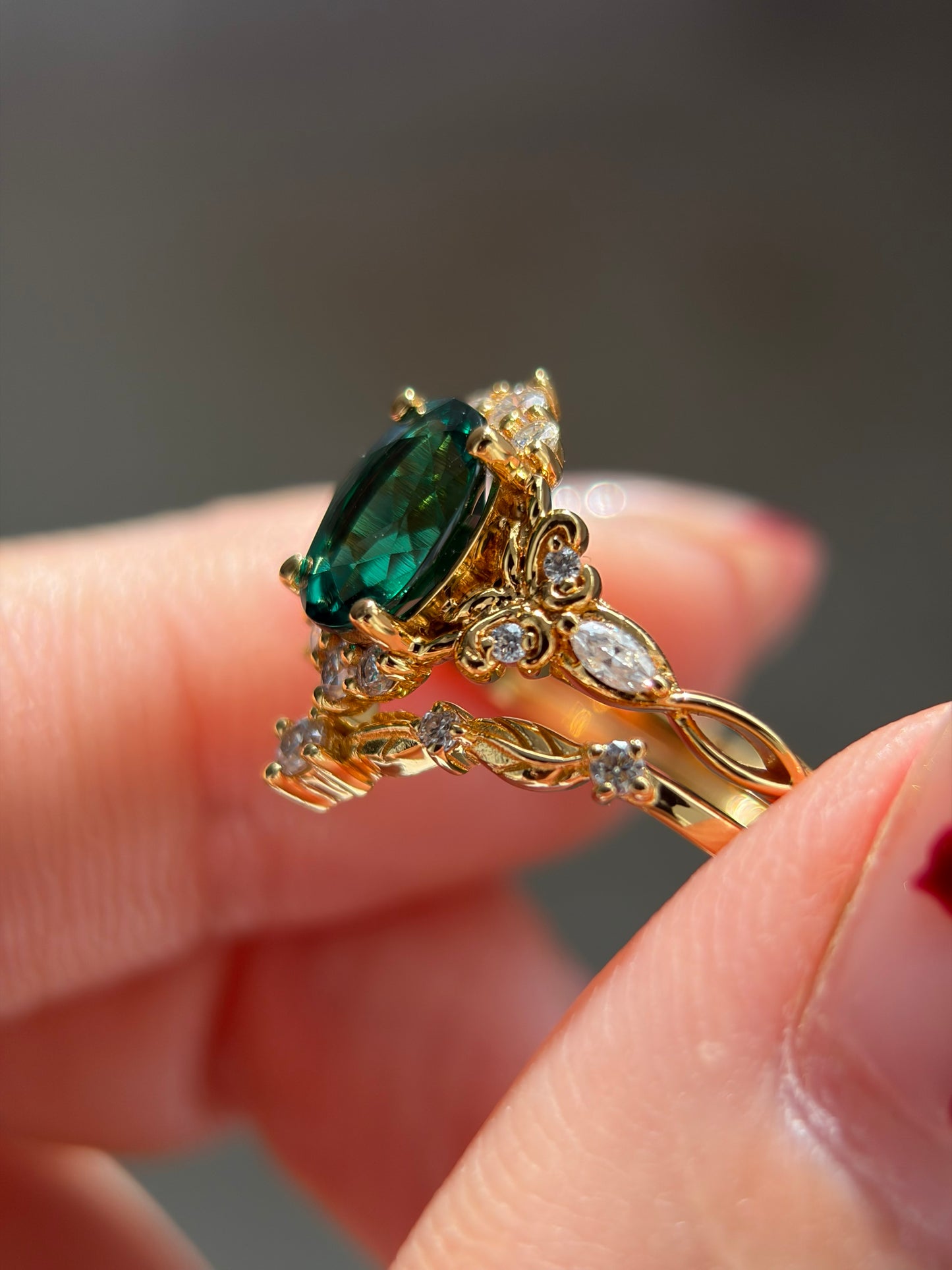 Forest Empress Non-traditional Engagement Ring with oval lab emerald 18k gold