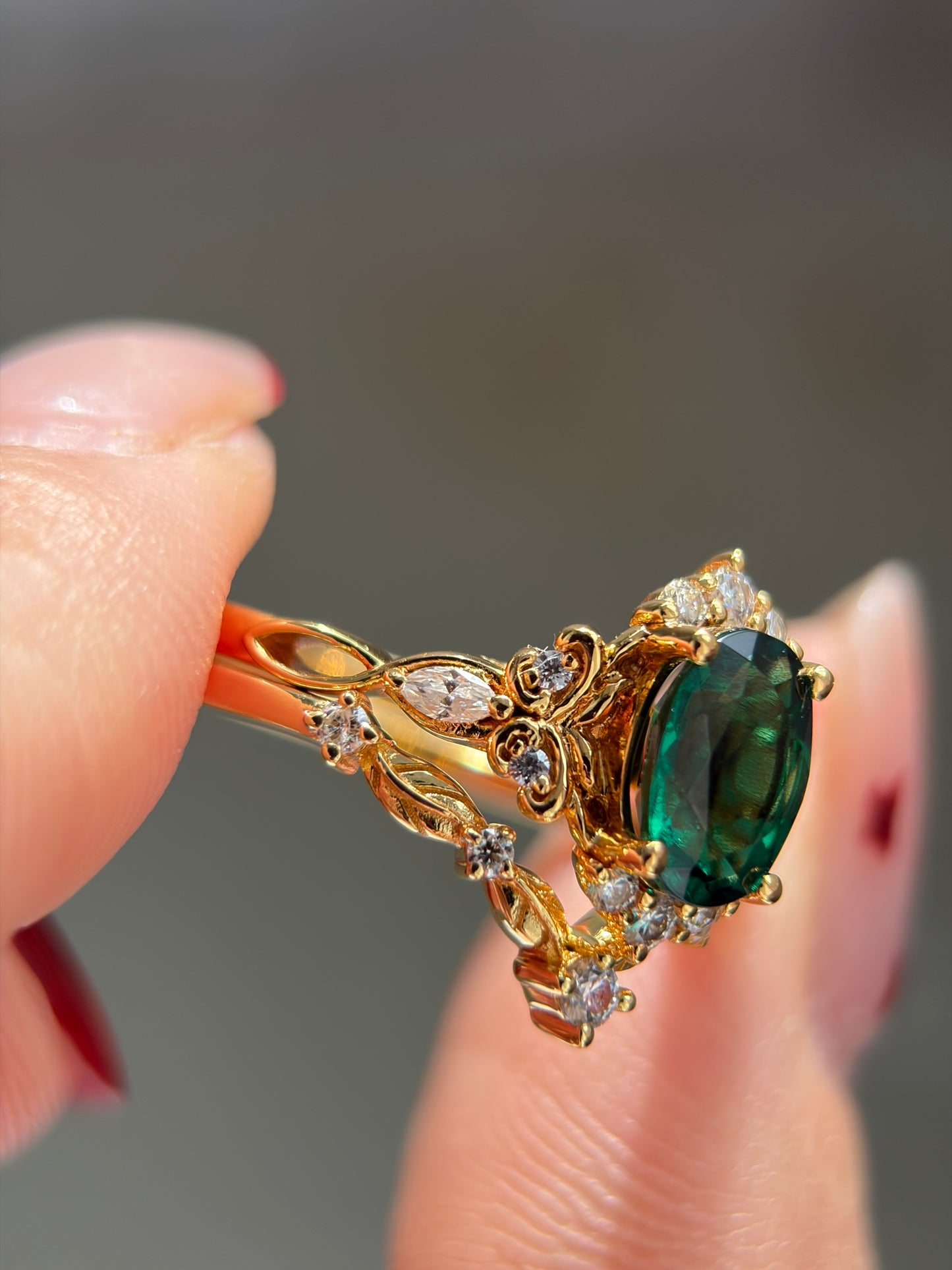 Forest Empress Non-traditional Engagement Ring with oval lab emerald 18k gold