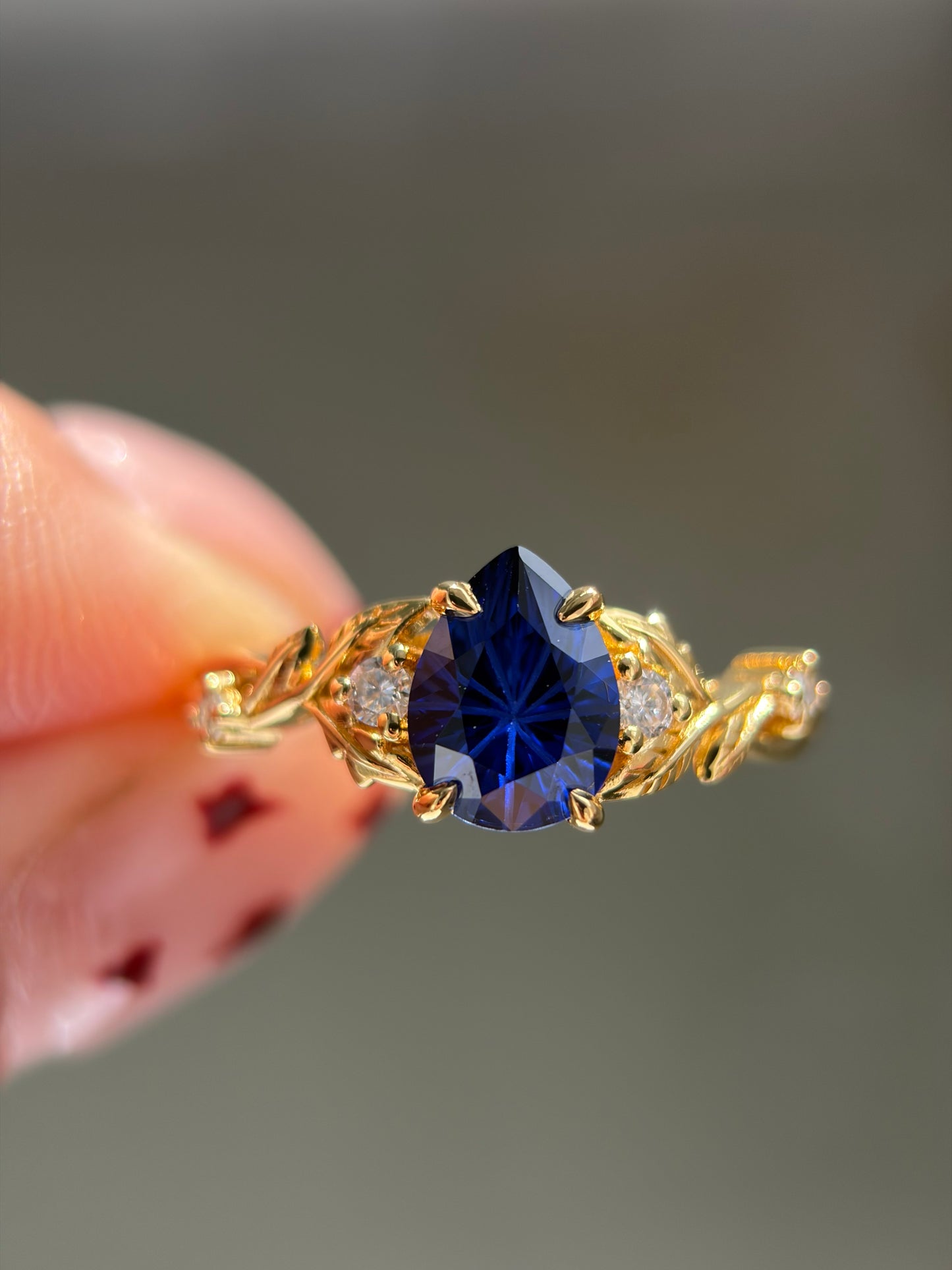 Midnight Ivy Non-traditional Engagement Ring with pear lab blue sapphire 14K yellow gold