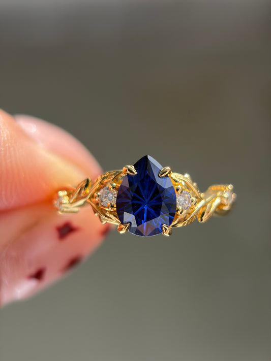 Midnight Ivy Non-traditional Engagement Ring with pear lab blue sapphire 14K yellow gold