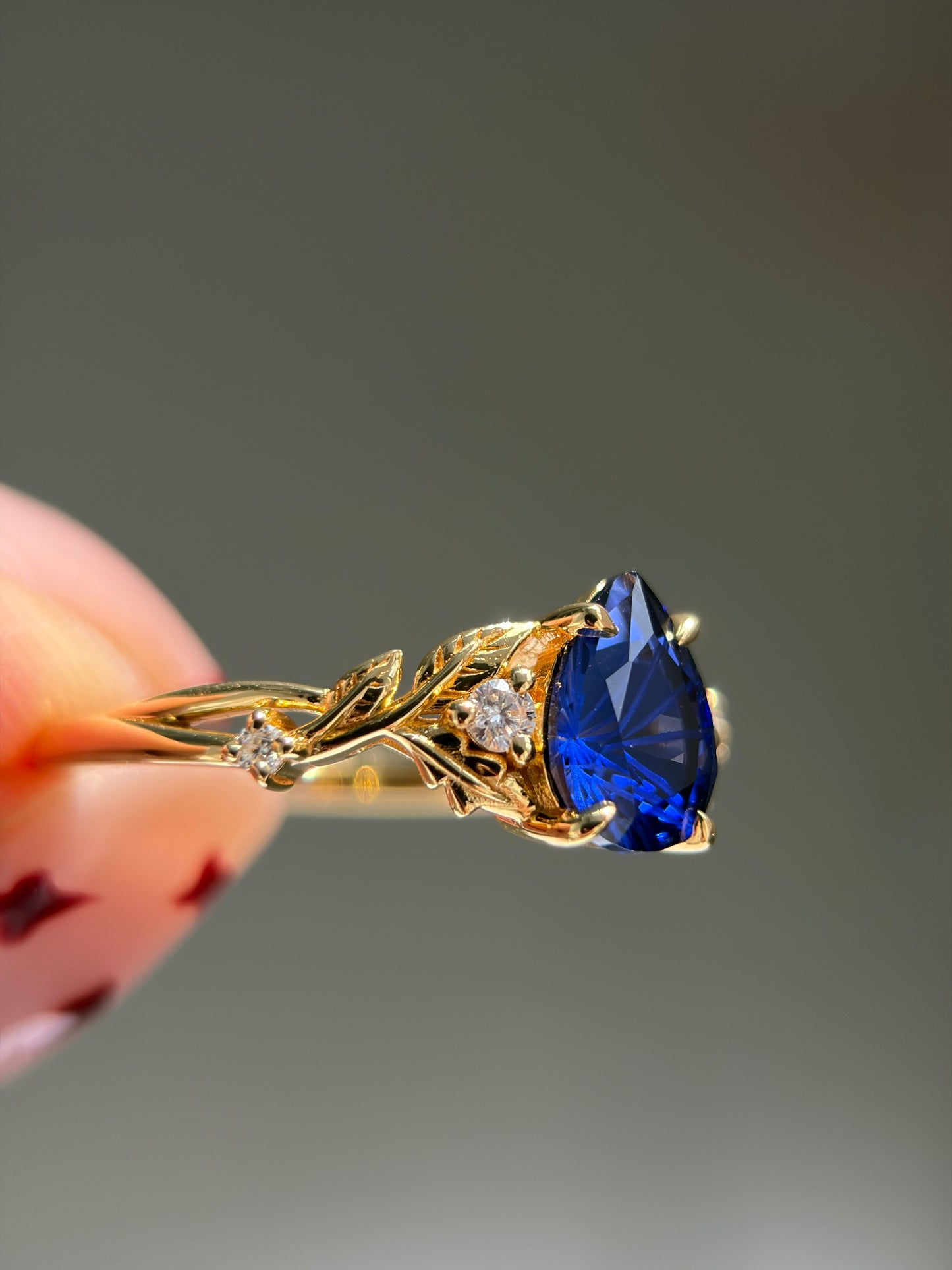 Midnight Ivy Non-traditional Engagement Ring with pear lab blue sapphire 14K yellow gold