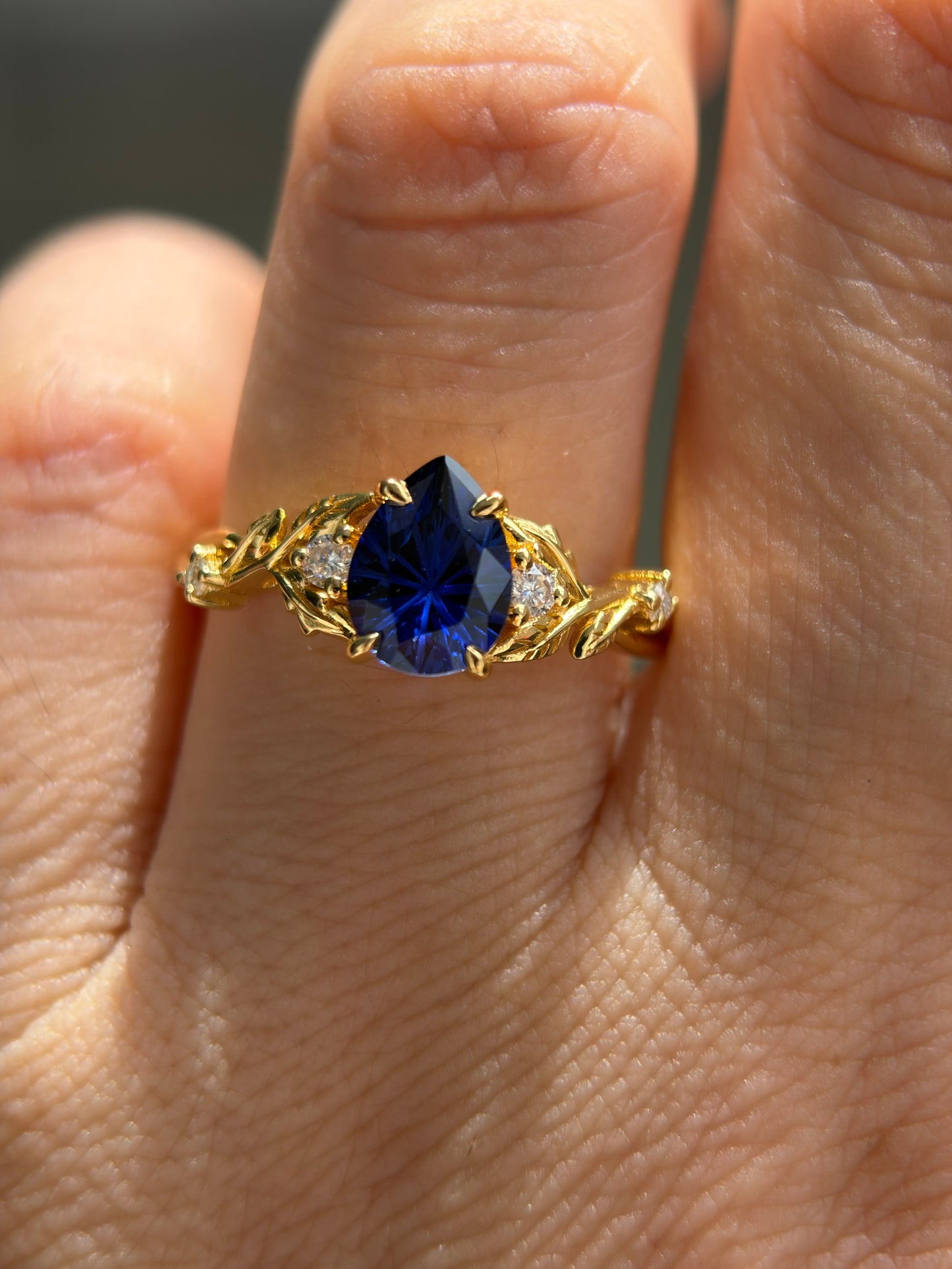 Midnight Ivy Non-traditional Engagement Ring with pear lab blue sapphire 14K yellow gold