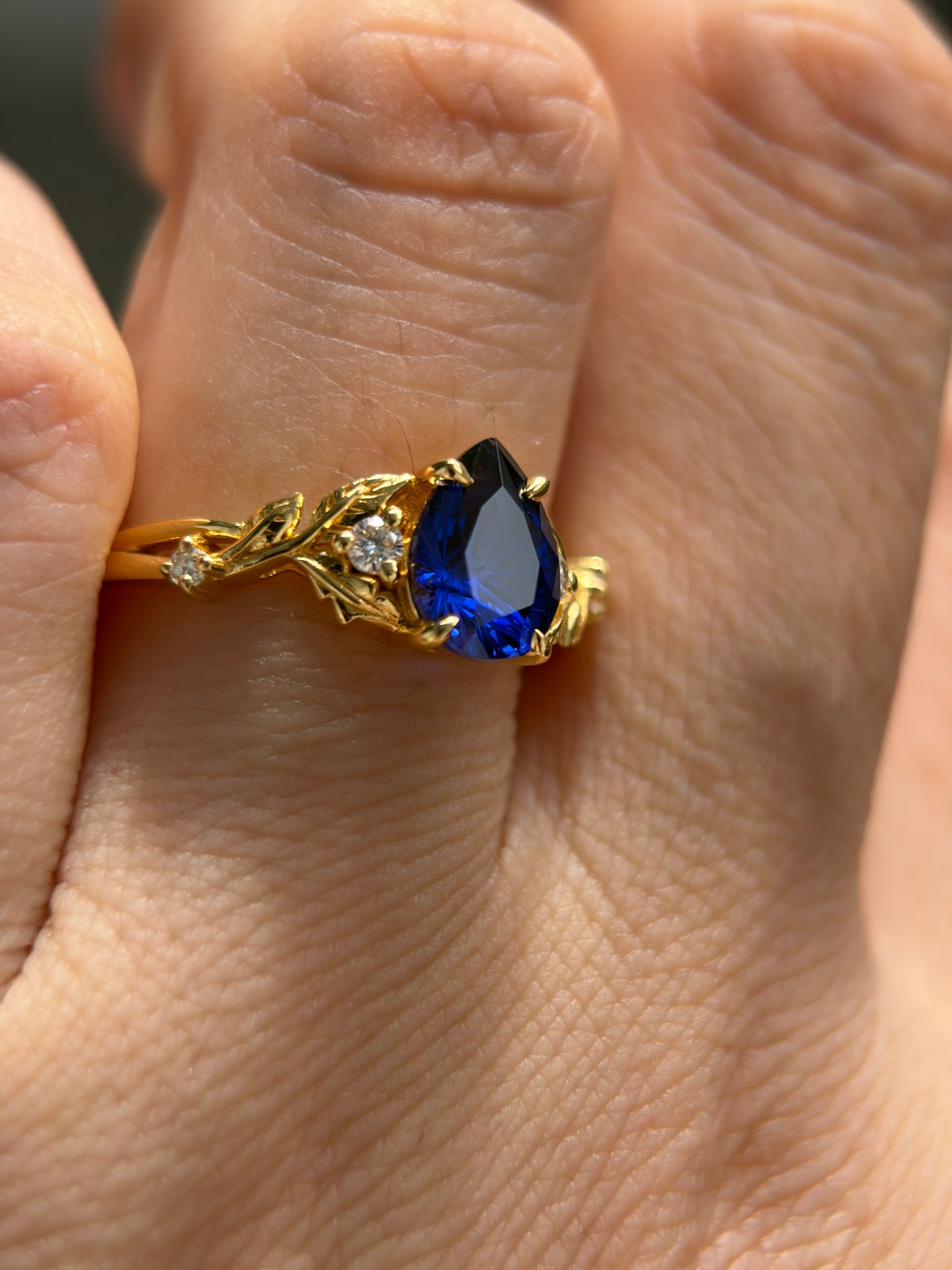 Midnight Ivy Non-traditional Engagement Ring with pear lab blue sapphire 14K yellow gold