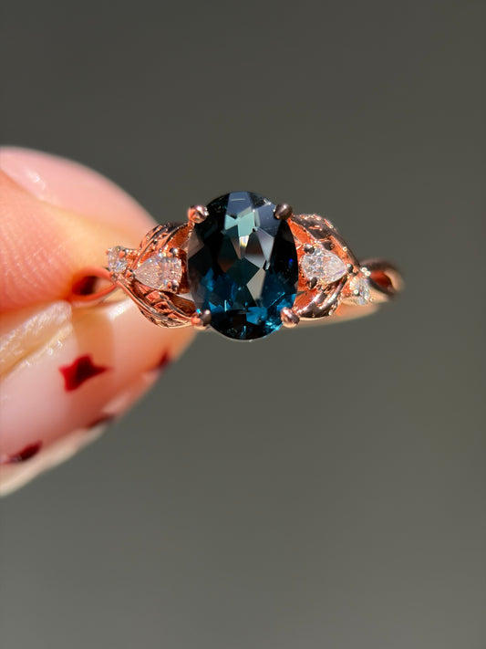Celestial Ivy Non-traditional Engagement Ring with oval lab blue topaz 14K rose gold