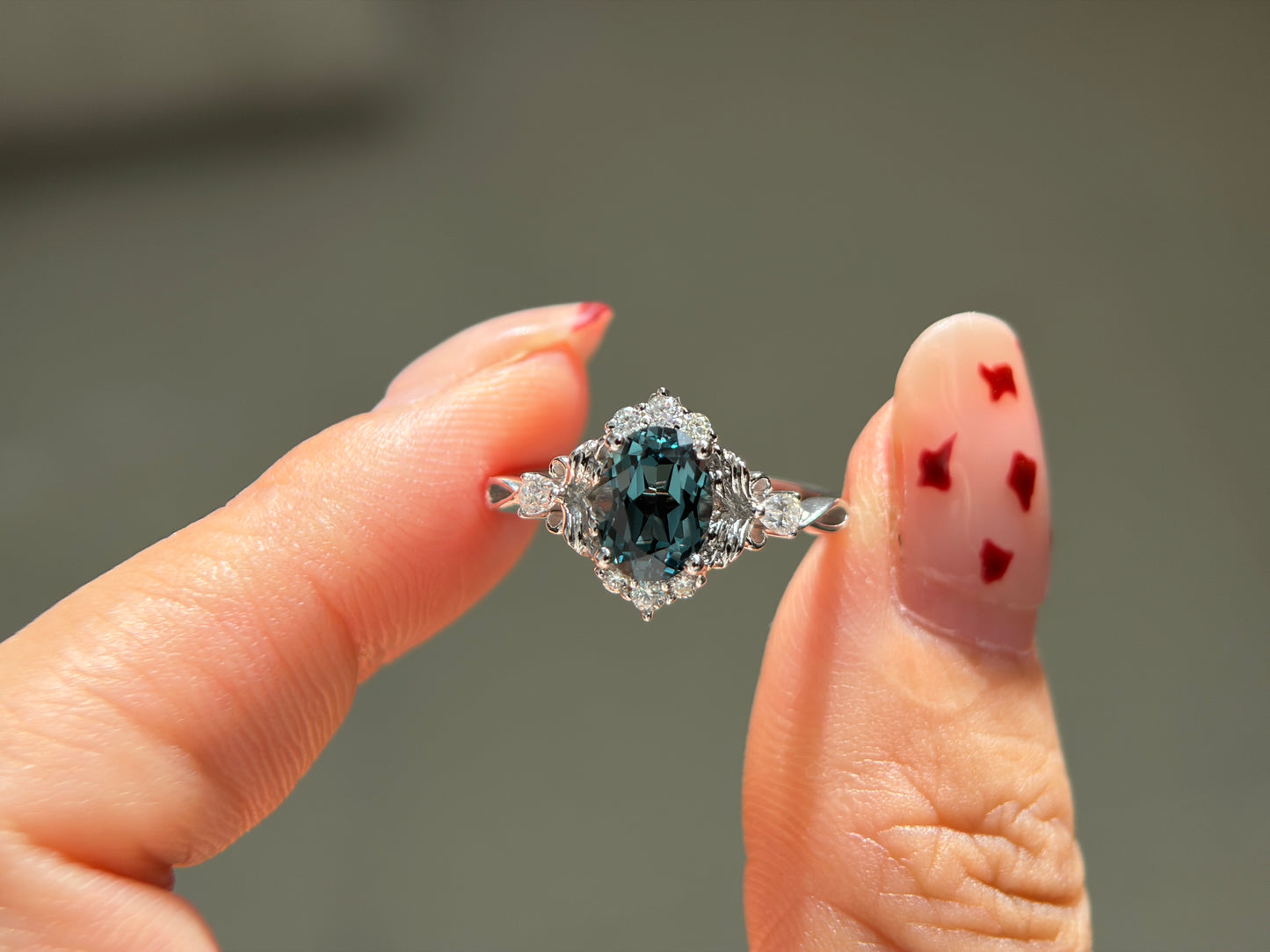 Abyss Crown Non-traditional Engagement Ring with oval lab green sapphire 14K gold
