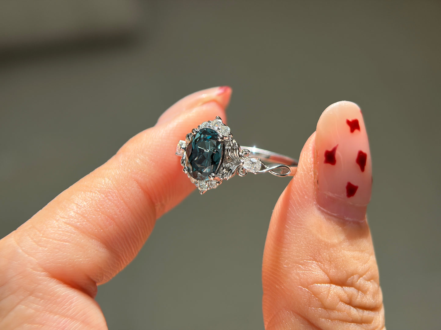Abyss Crown Non-traditional Engagement Ring with oval lab green sapphire 14K gold