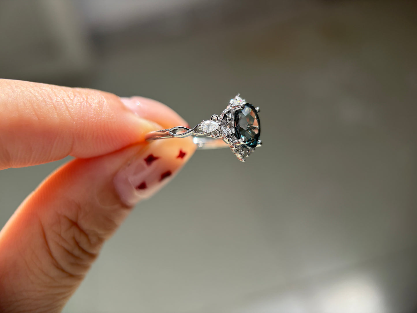 Abyss Crown Non-traditional Engagement Ring with oval lab green sapphire 14K gold