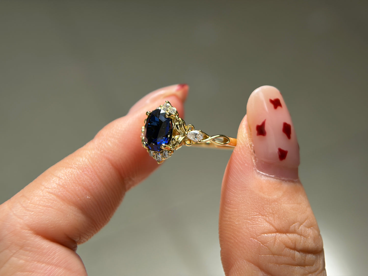 Abyss Crown Non-traditional Engagement Ring with oval lab blue sapphire 14K gold