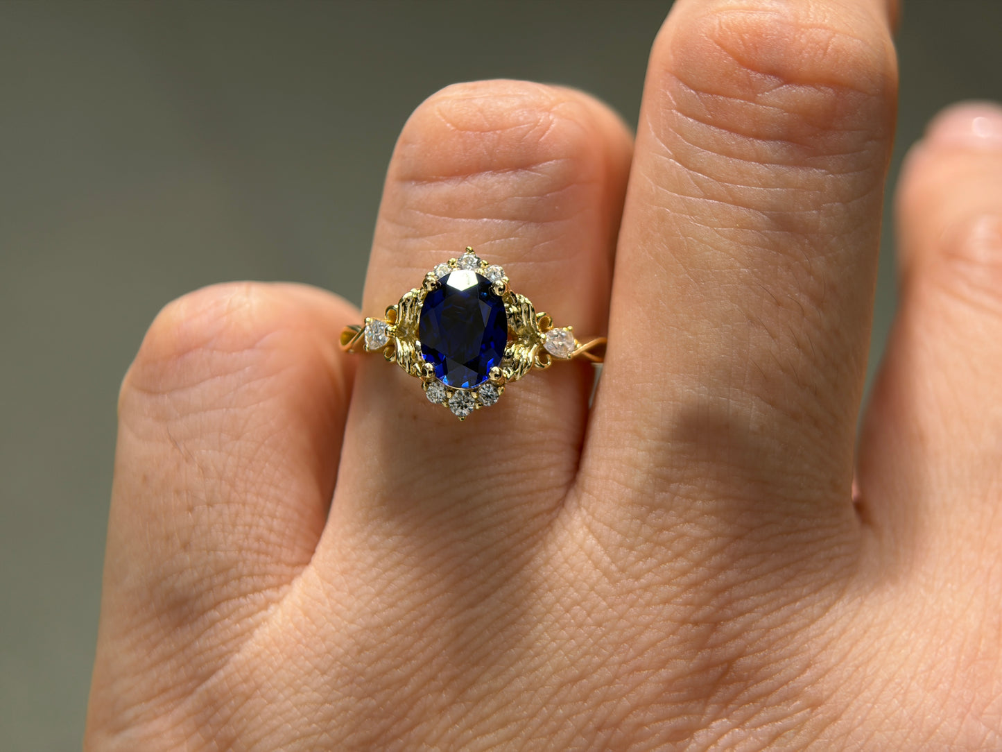 Abyss Crown Non-traditional Engagement Ring with oval lab blue sapphire 14K gold