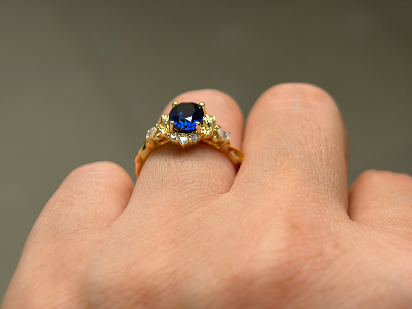Abyss Crown Non-traditional Engagement Ring with oval lab blue sapphire 14K gold