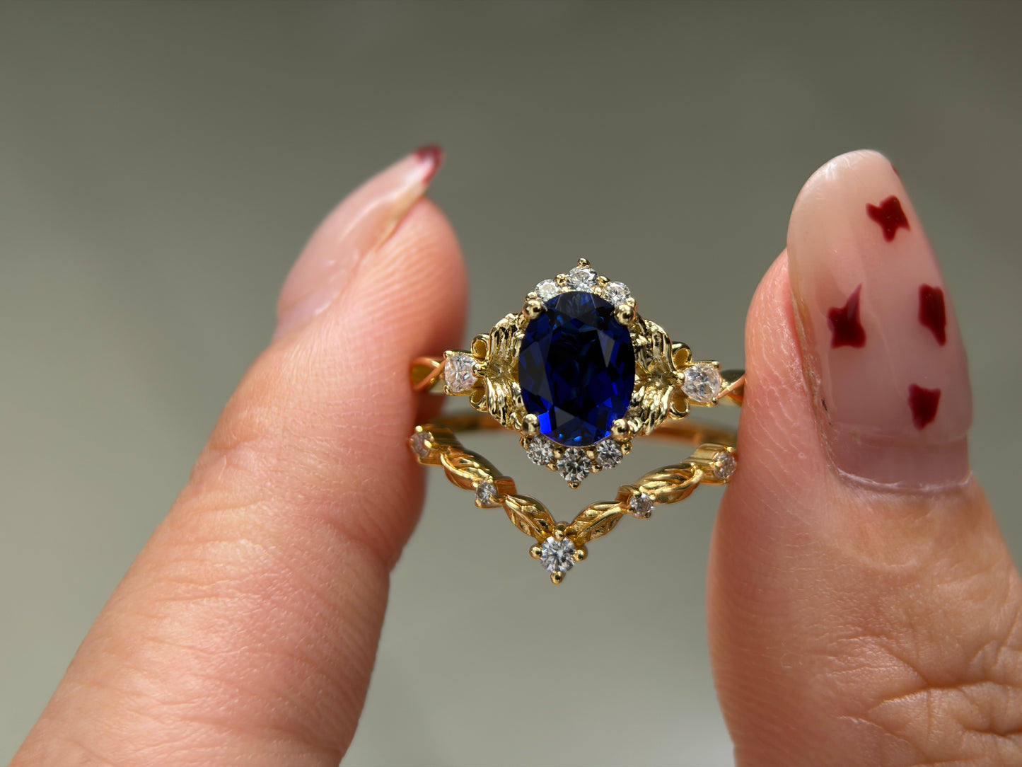Abyss Crown Non-traditional Engagement Ring with oval lab blue sapphire 14K gold
