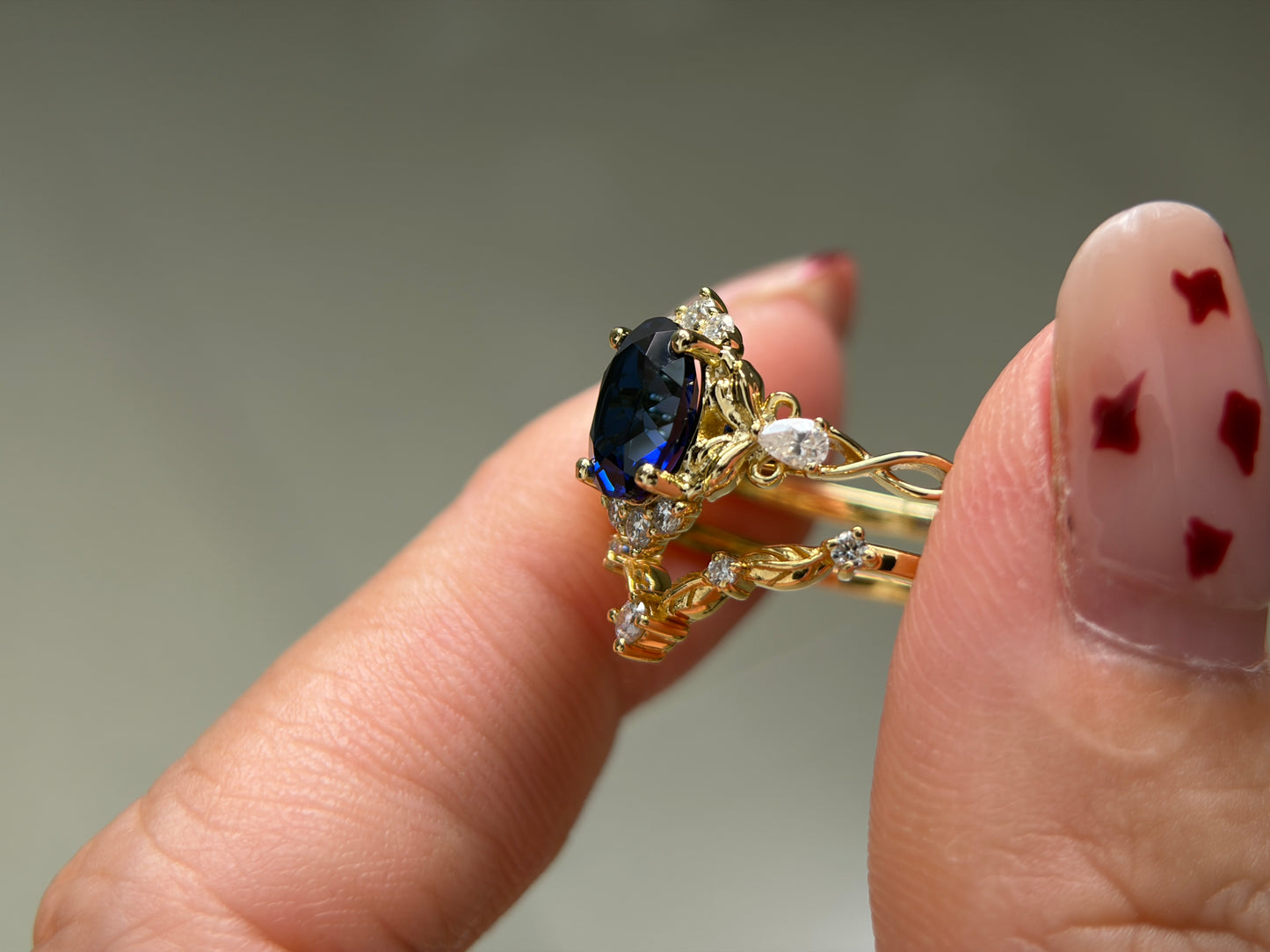 Abyss Crown Non-traditional Engagement Ring with oval lab blue sapphire 14K gold