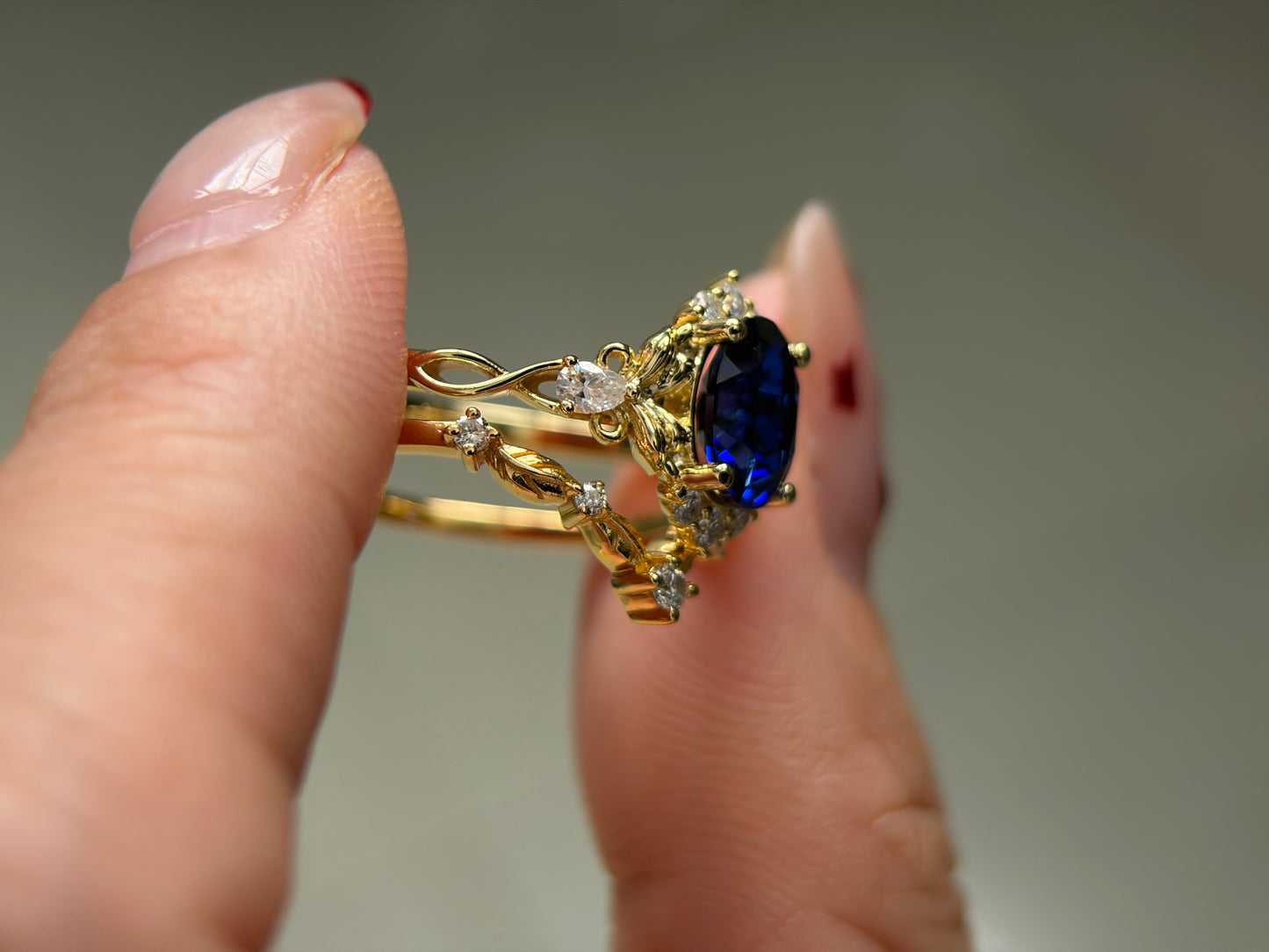 Abyss Crown Non-traditional Engagement Ring with oval lab blue sapphire 14K gold