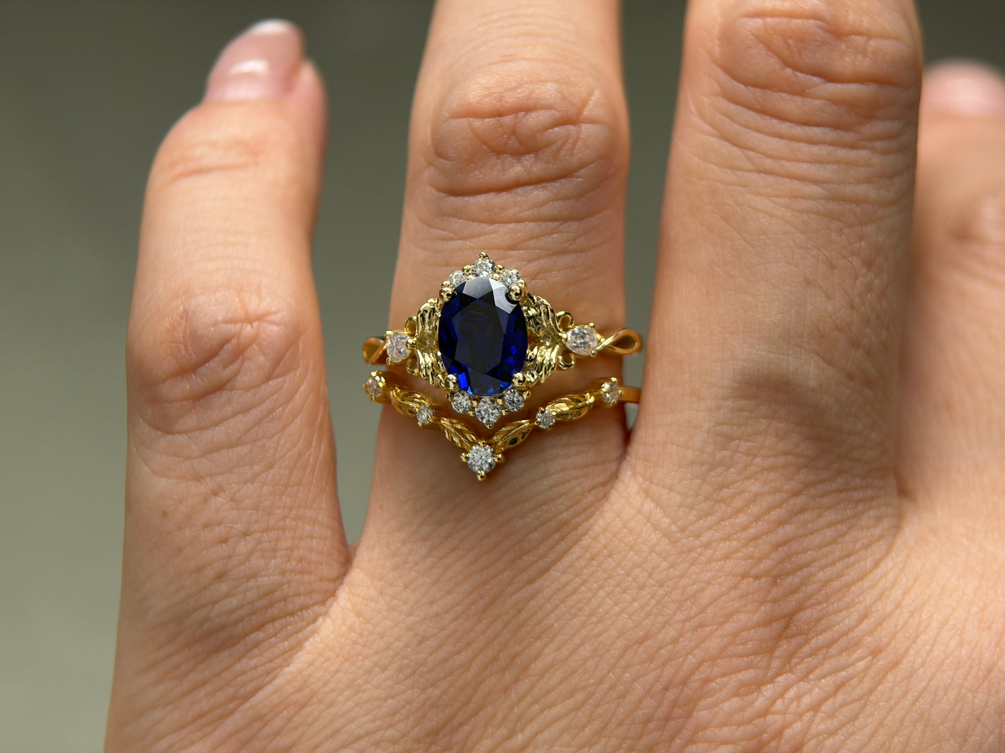 Abyss Crown Non-traditional Engagement Ring with oval lab blue sapphire 14K gold