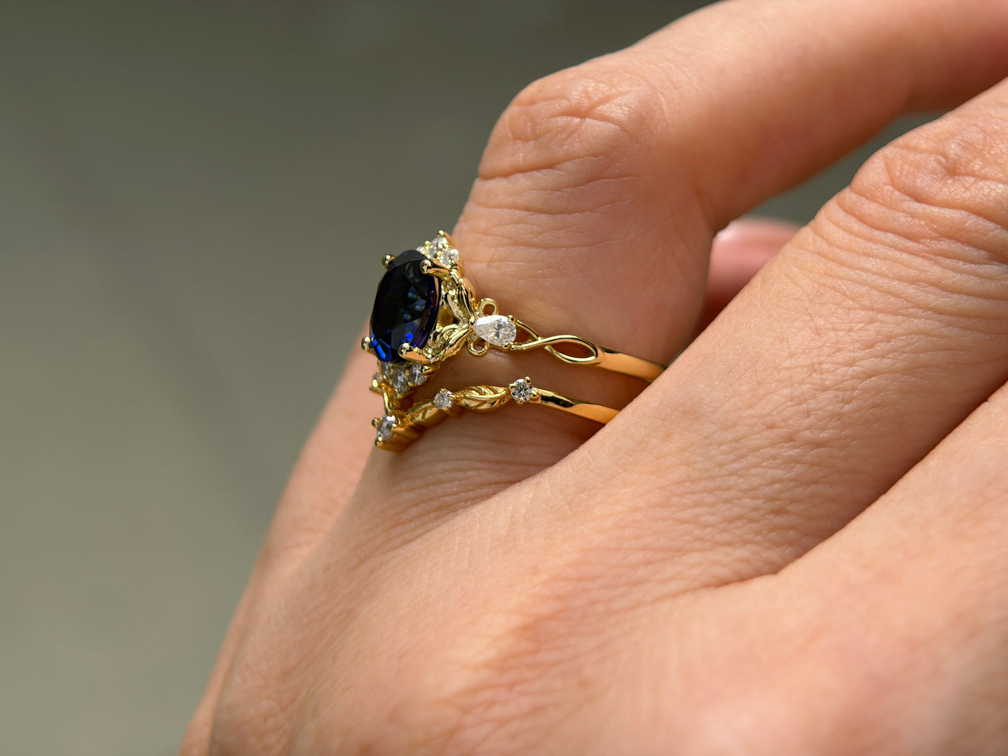 Abyss Crown Non-traditional Engagement Ring with oval lab blue sapphire 14K gold