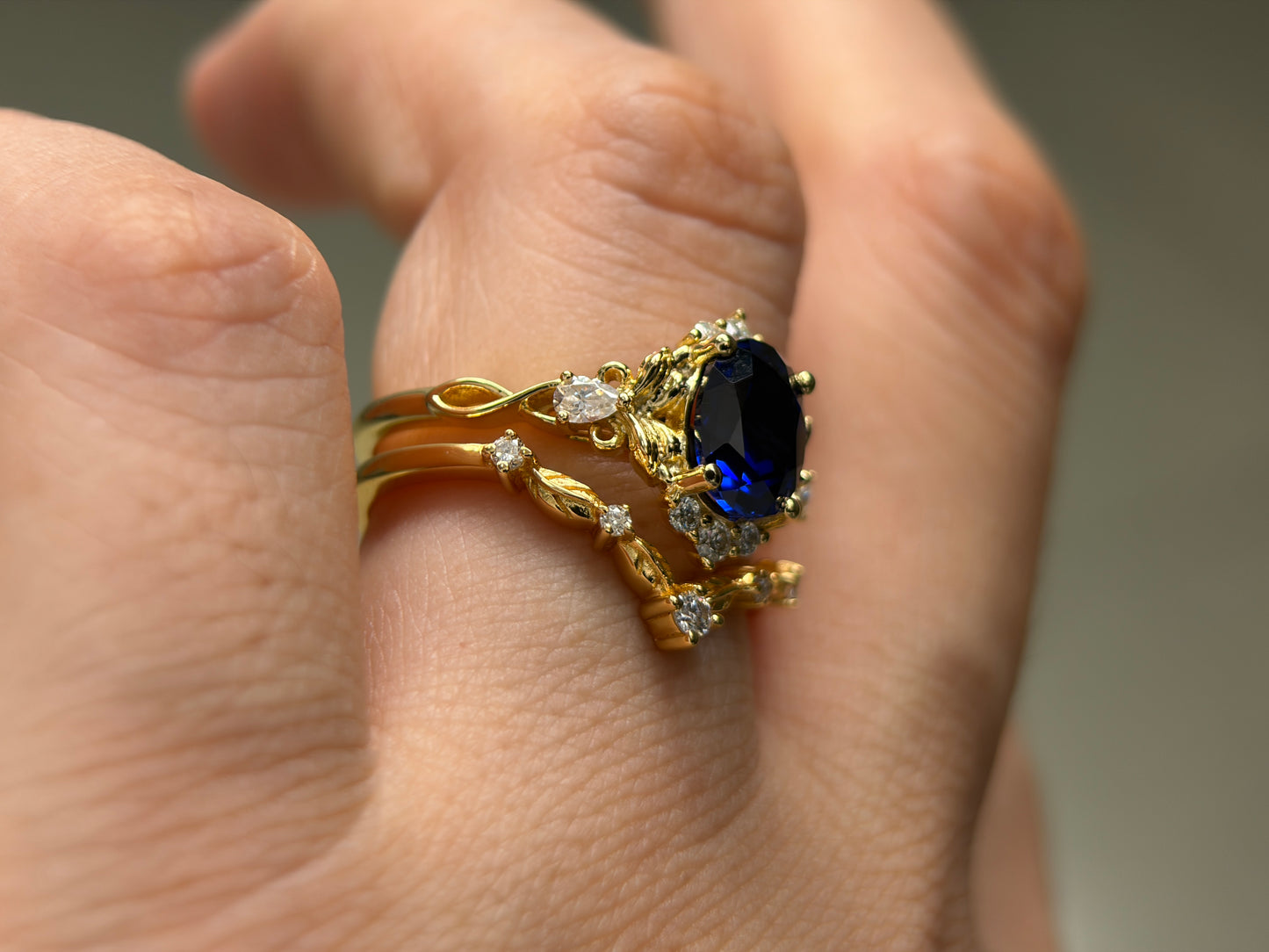 Abyss Crown Non-traditional Engagement Ring with oval lab blue sapphire 14K gold